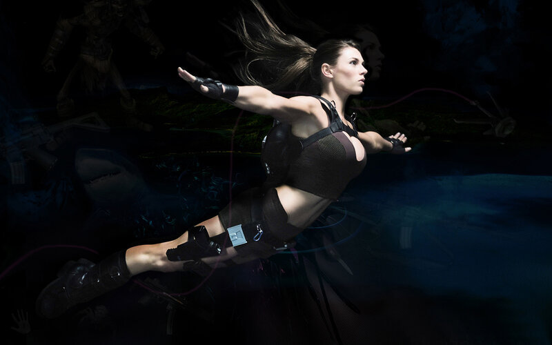 woman in combat gear underwater