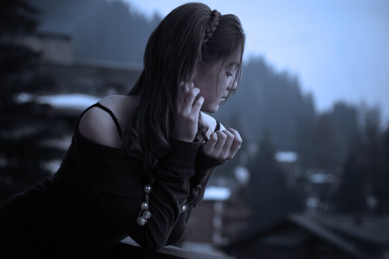 woman in contemplative pose