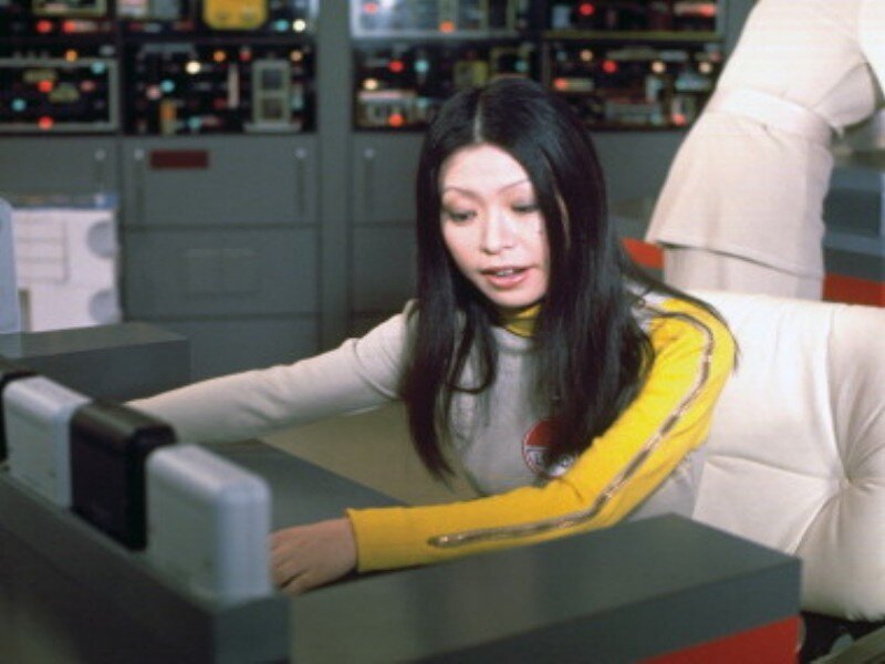 Woman in Control Room — Yellow