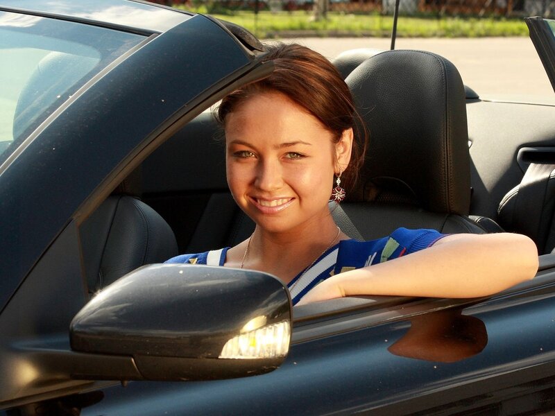 Woman in convertible car