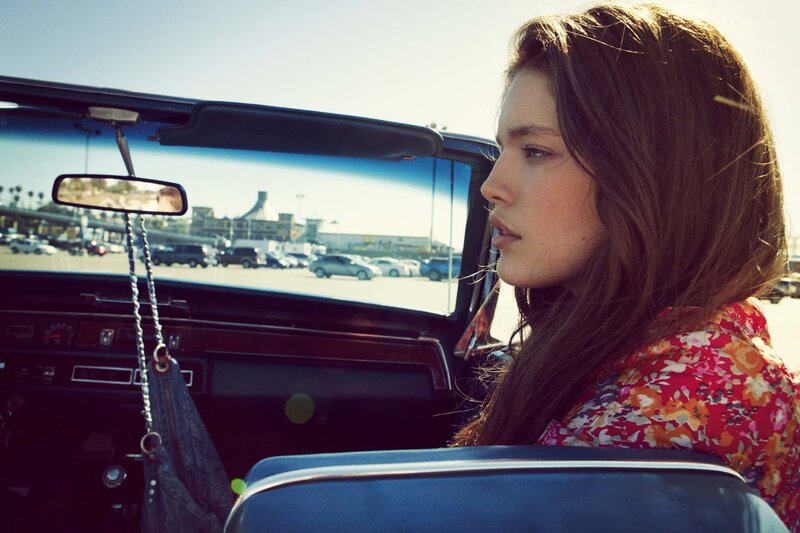 woman in convertible car