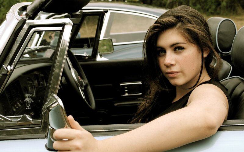 woman in convertible car