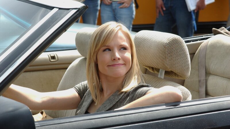 Woman in convertible car