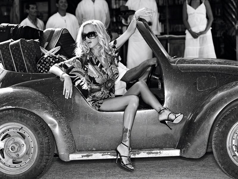 woman in convertible car