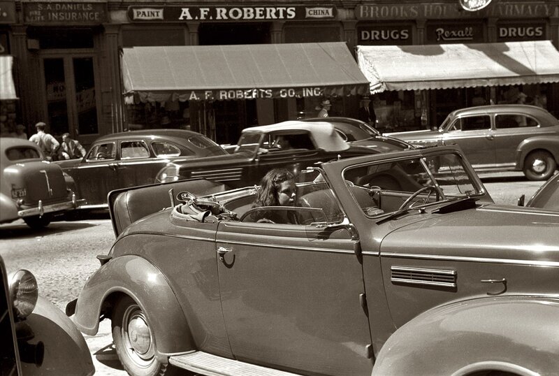 Woman in Convertible Car — Black, Busy, Afternoon