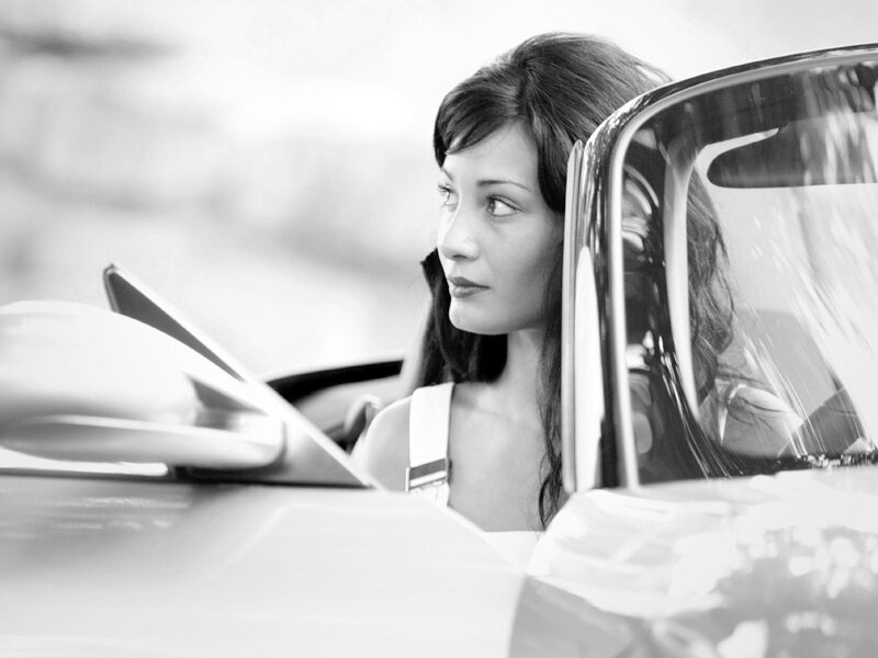 Woman in Convertible Car — Black, Contemplative