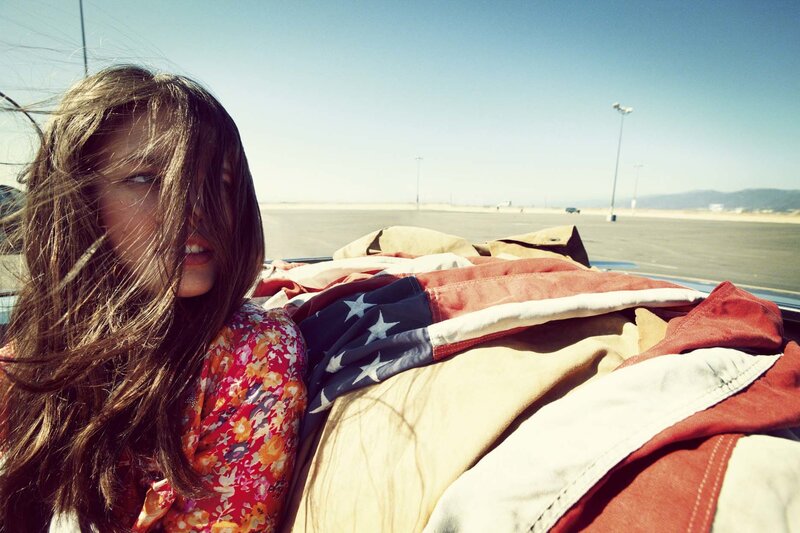 Woman in Convertible Car — Red