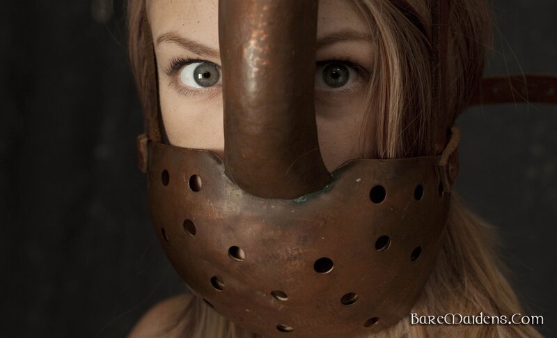 woman in copper mask