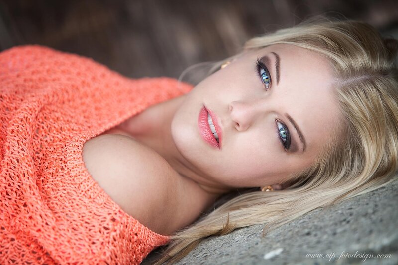 woman in coral sweater