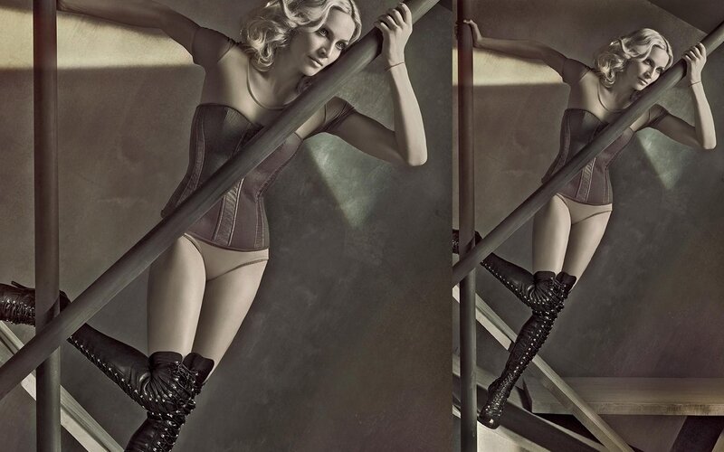 woman in corset on stairs