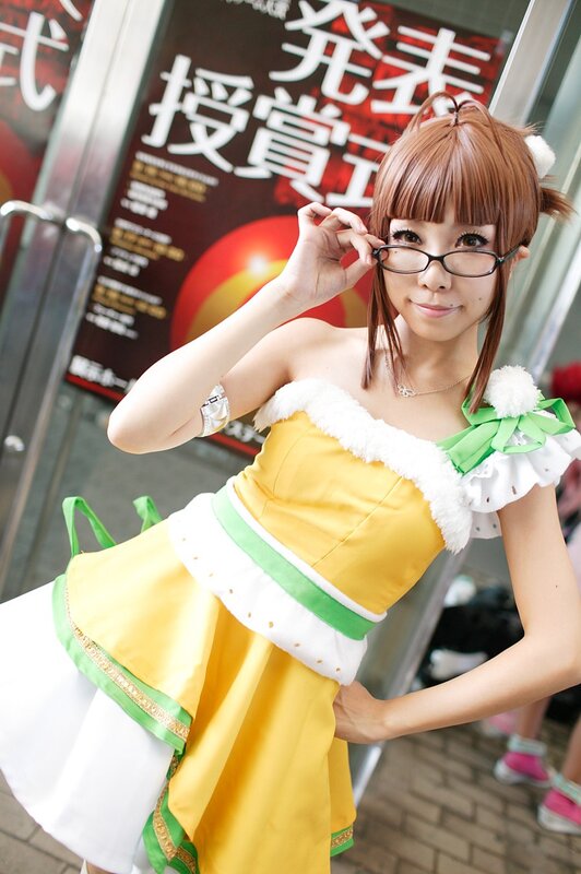 Woman in Cosplay Costume — Yellow, Playful, Afternoon