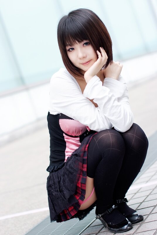 woman in cosplay crouching