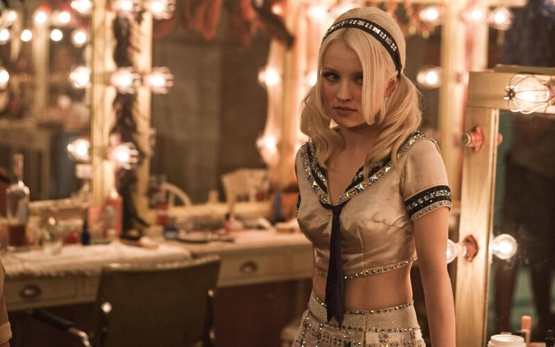 woman in costume backstage