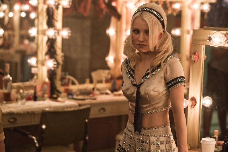 woman in costume backstage
