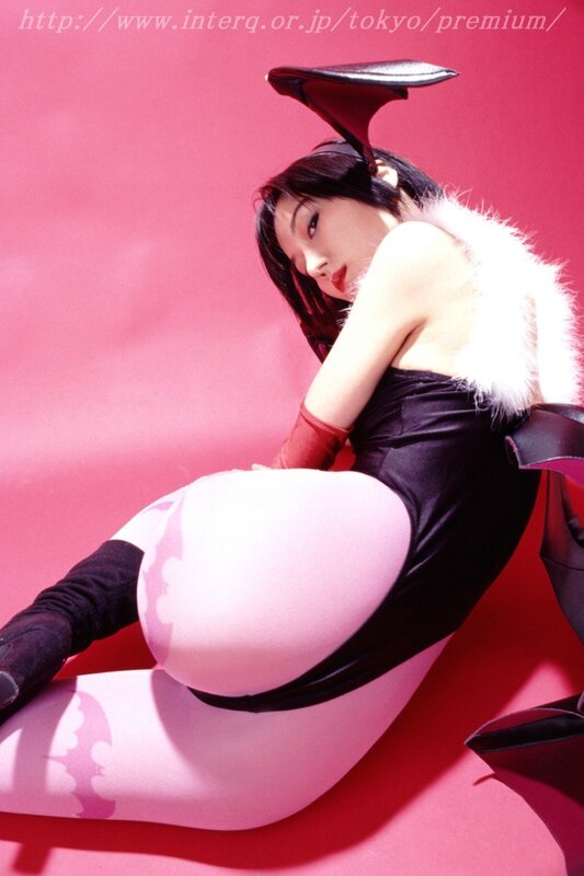 woman in costume on pink background