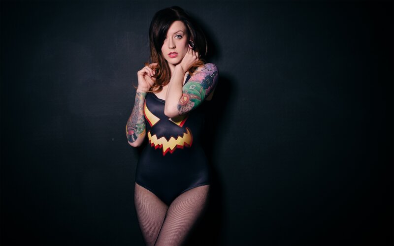 woman in costume with tattoos