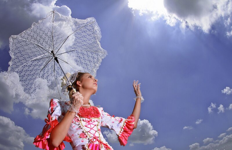 Woman in Costume with Umbrella
