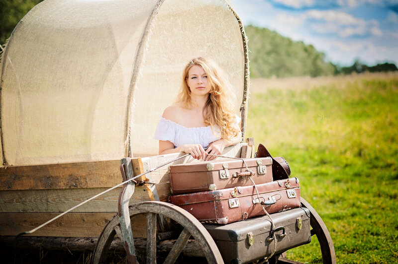 Woman in Covered Wagon