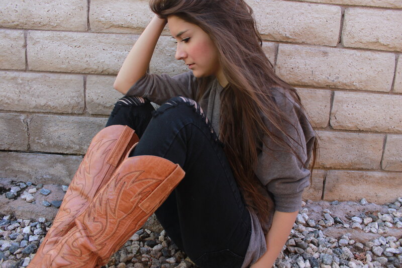 Woman in Cowboy Boots — Brown, Contemplative, Afternoon