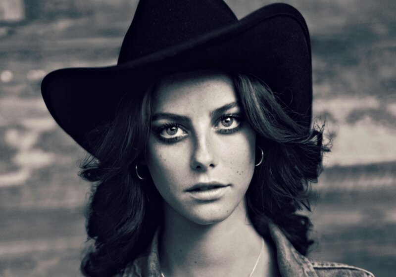 Woman in Cowboy Hat — Black, Serious, Photograph