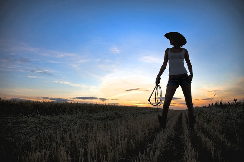 Woman in Cowboy Hat — Blue, Dramatic, Sunset, Photograph, Field