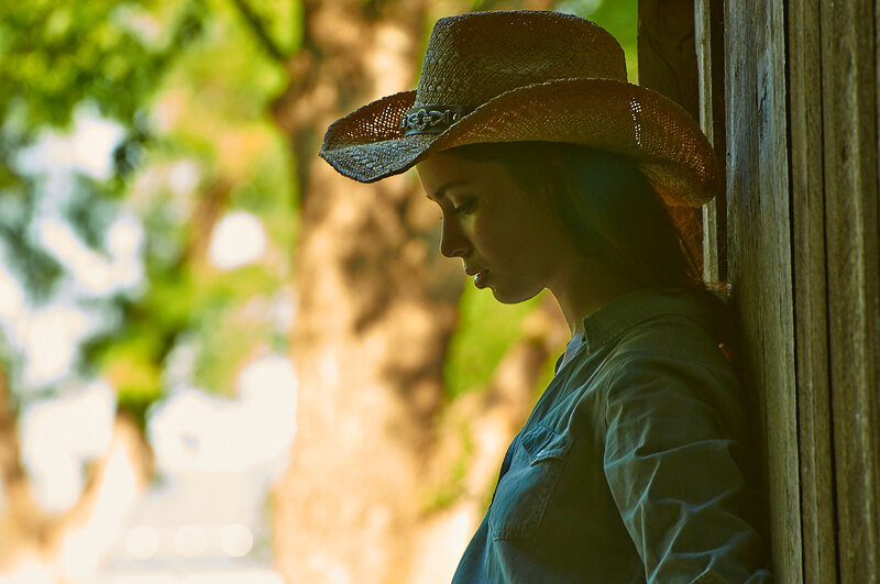 Woman in Cowboy Hat — Green, Contemplative
