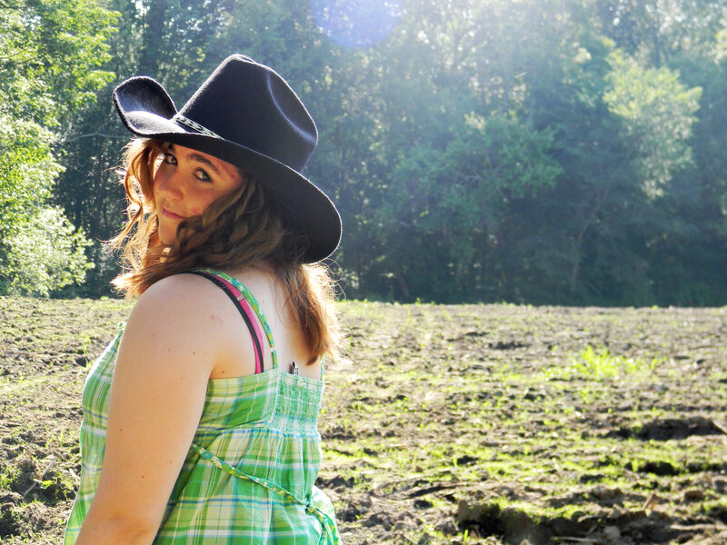 Woman in Cowboy Hat — Green, Serene, Afternoon