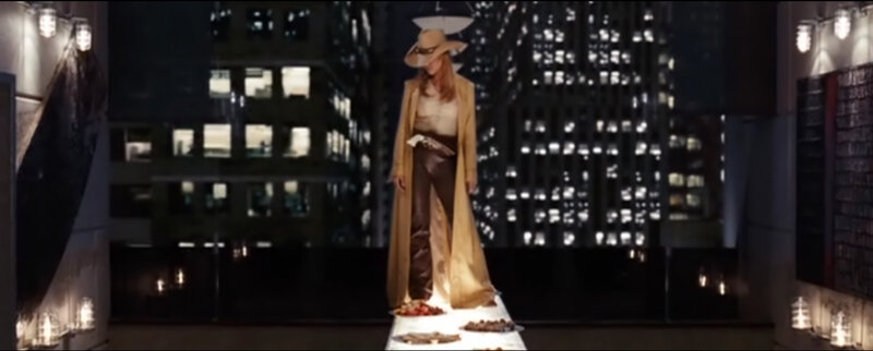 woman in cowboy hat on rooftop