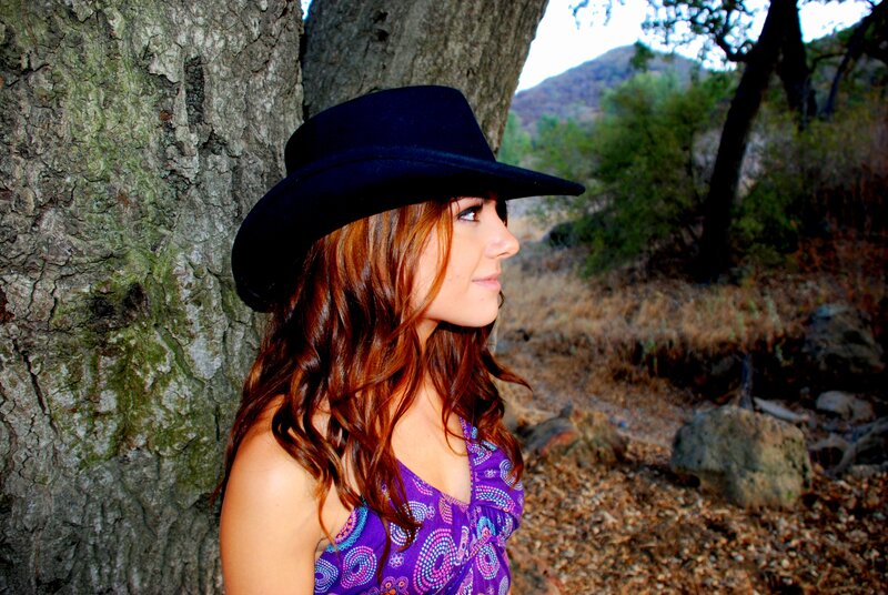 Woman in Cowboy Hat — Purple, Serene, Afternoon