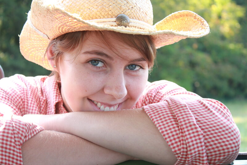 Woman in Cowboy Hat — Red, Relaxed, Afternoon, Photograph