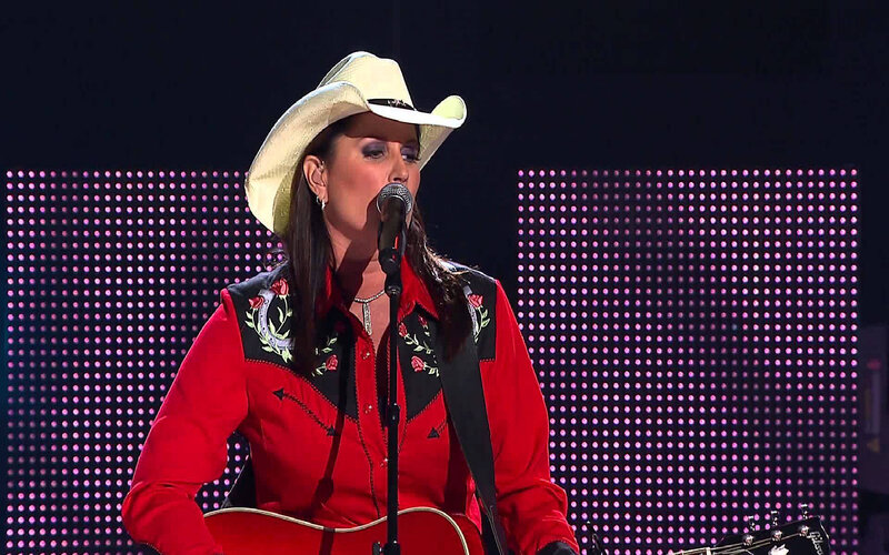 Woman in Cowboy Hat Singing — Red