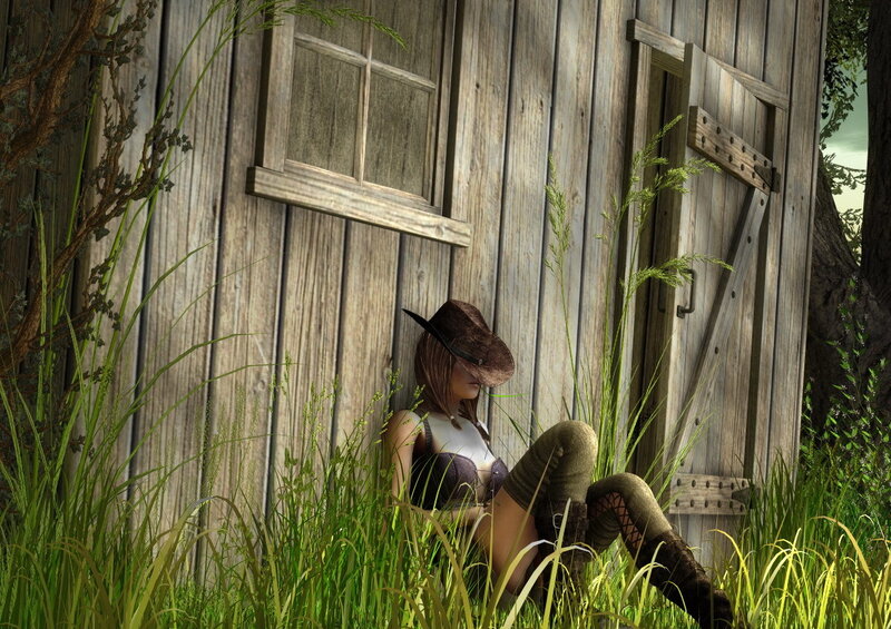 Woman in cowboy hat sitting outside