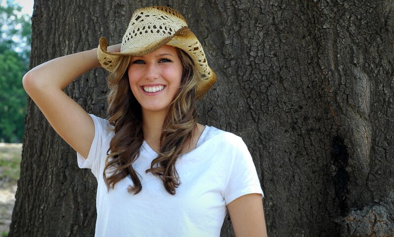 Woman in Cowboy Hat — White, Happy, Afternoon
