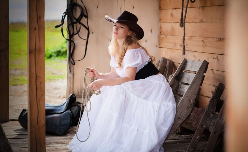 Woman in Cowboy Hat — White, Serene, Afternoon, Photograph