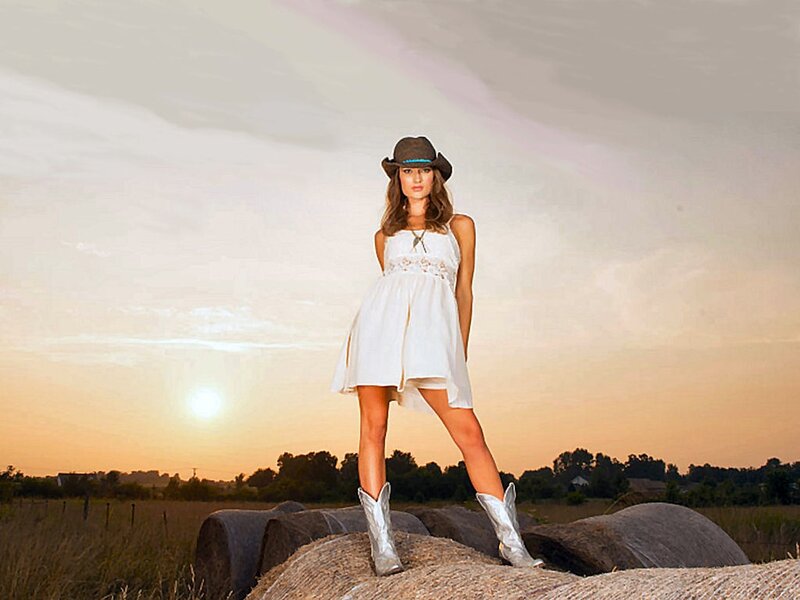 Woman in Cowboy Hat — White, Serene, Sunset