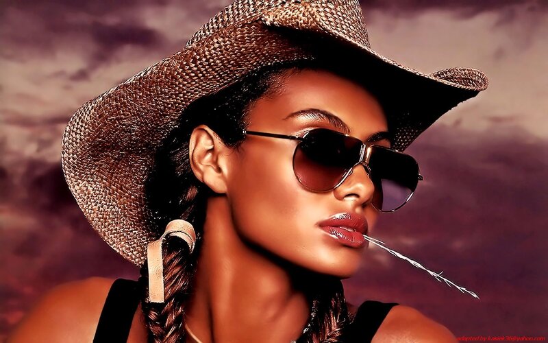 woman in cowboy hat with sunglasses