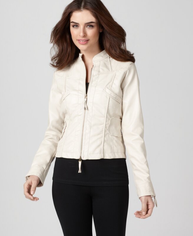 woman in cream jacket
