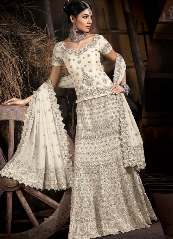 woman in cream lehenga