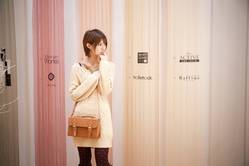 woman in cream sweater