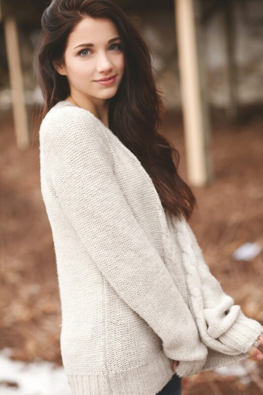 woman in cream sweater