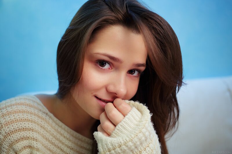 woman in cream sweater