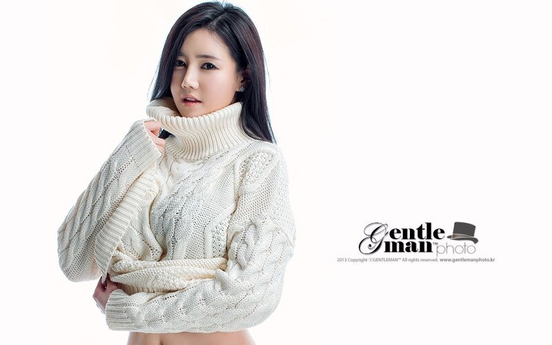 woman in cream sweater