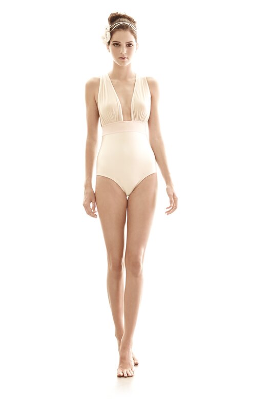 woman in cream swimsuit