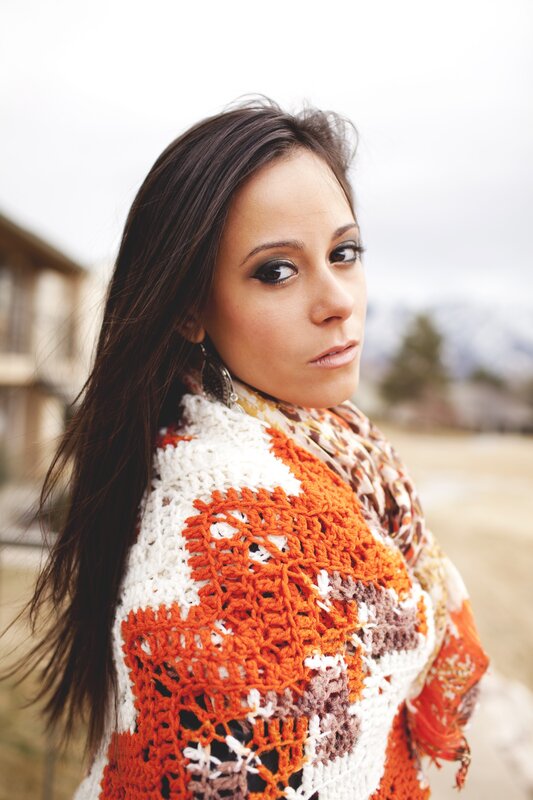 woman in crocheted sweater