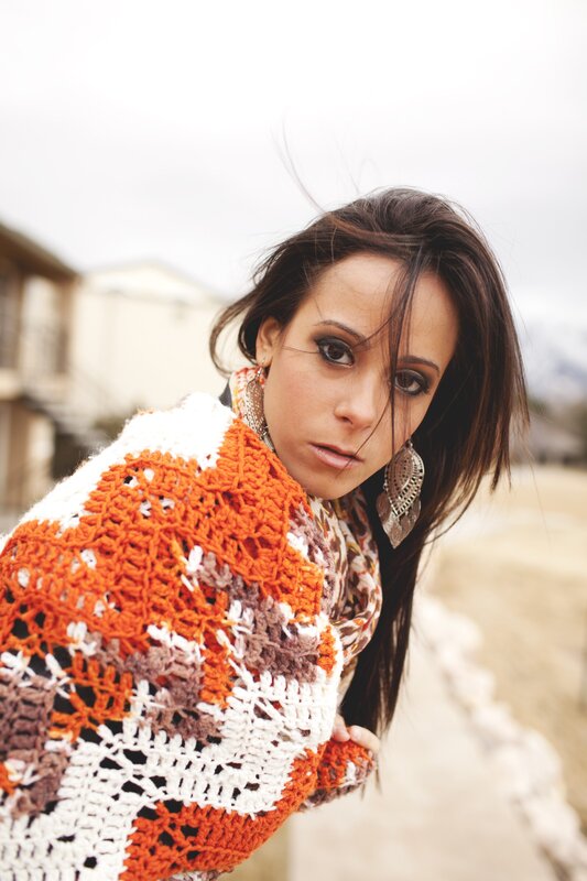 woman in crocheted sweater