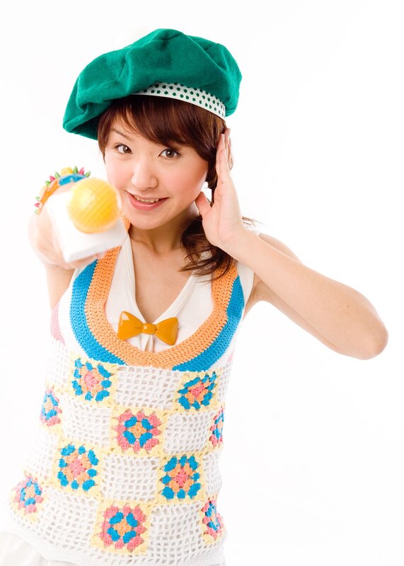 woman in crocheted vest