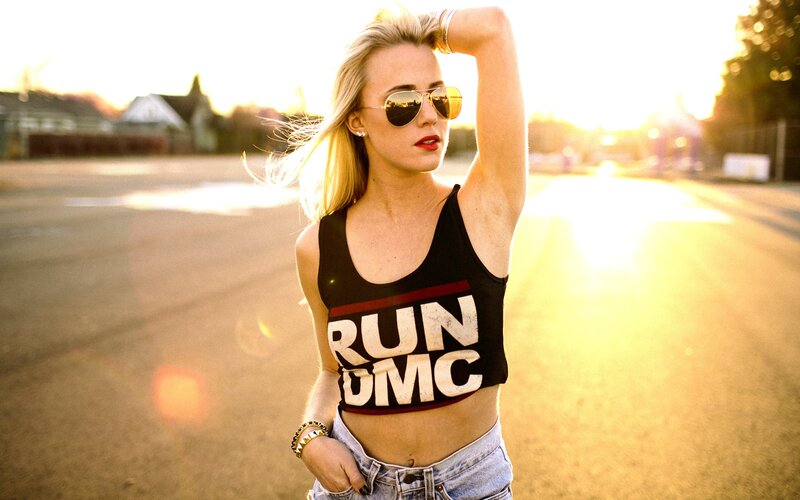 woman in crop top at sunset