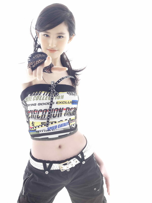 woman in crop top pointing