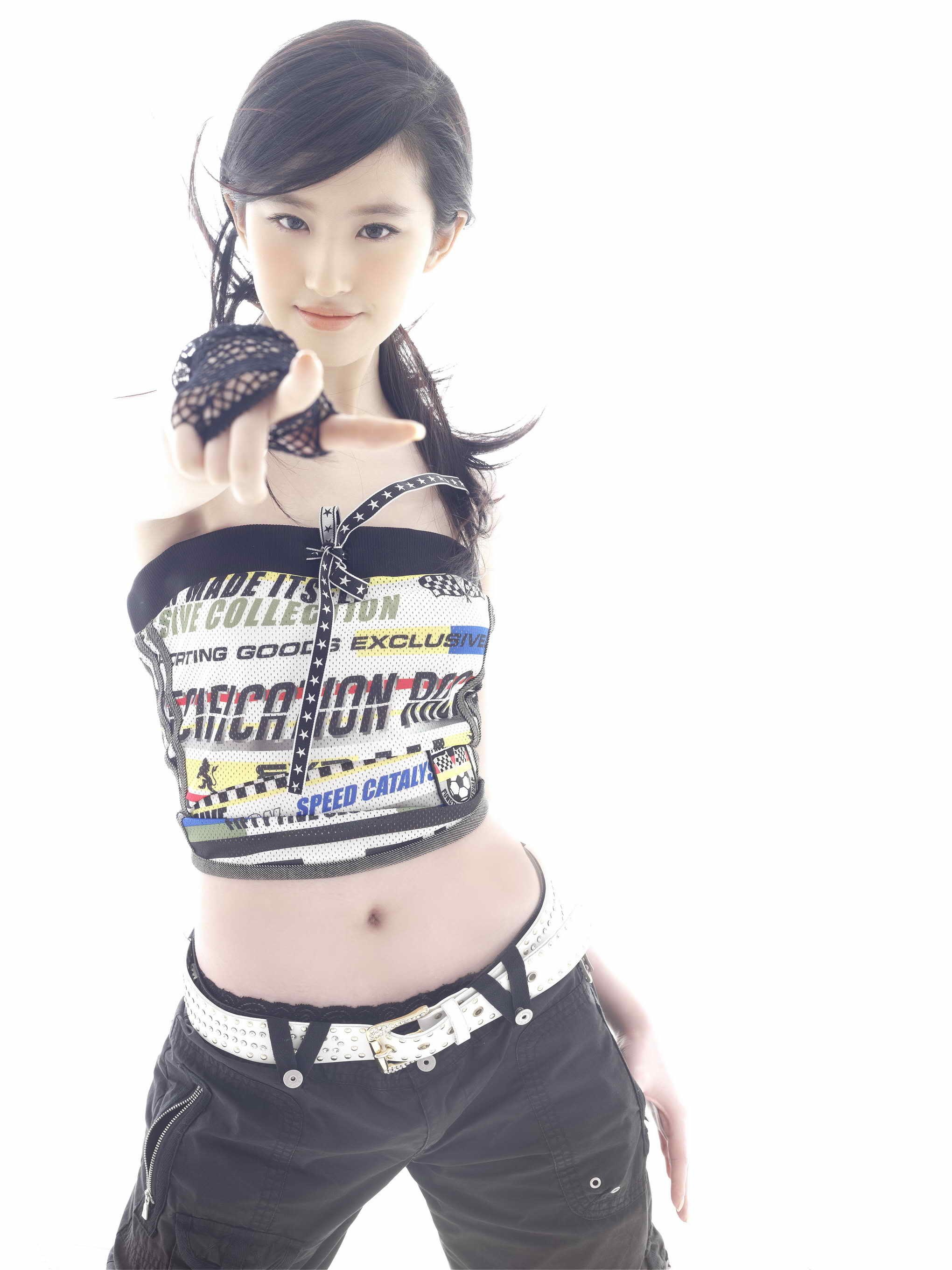 woman in crop top pointing
