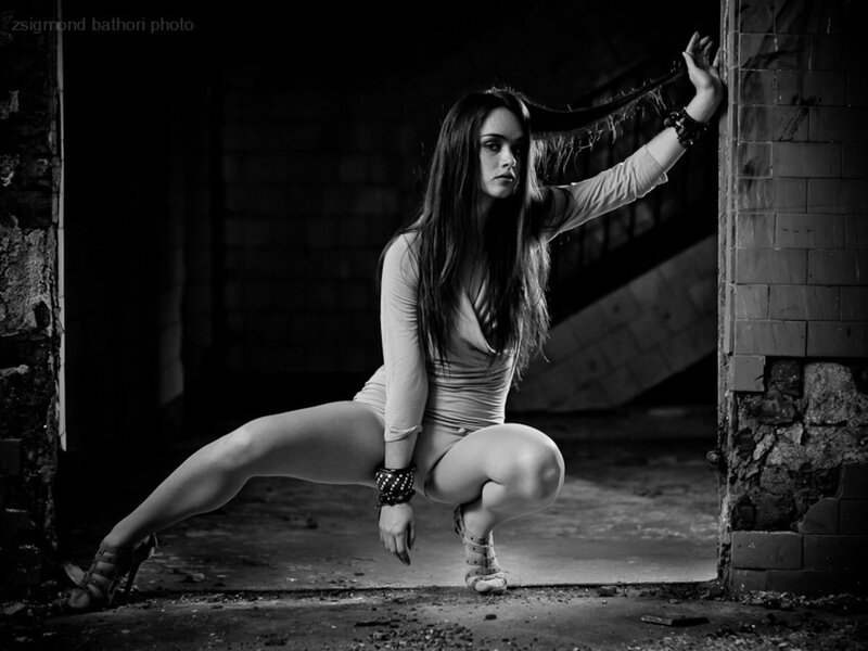 Woman in Crouching Pose — Black